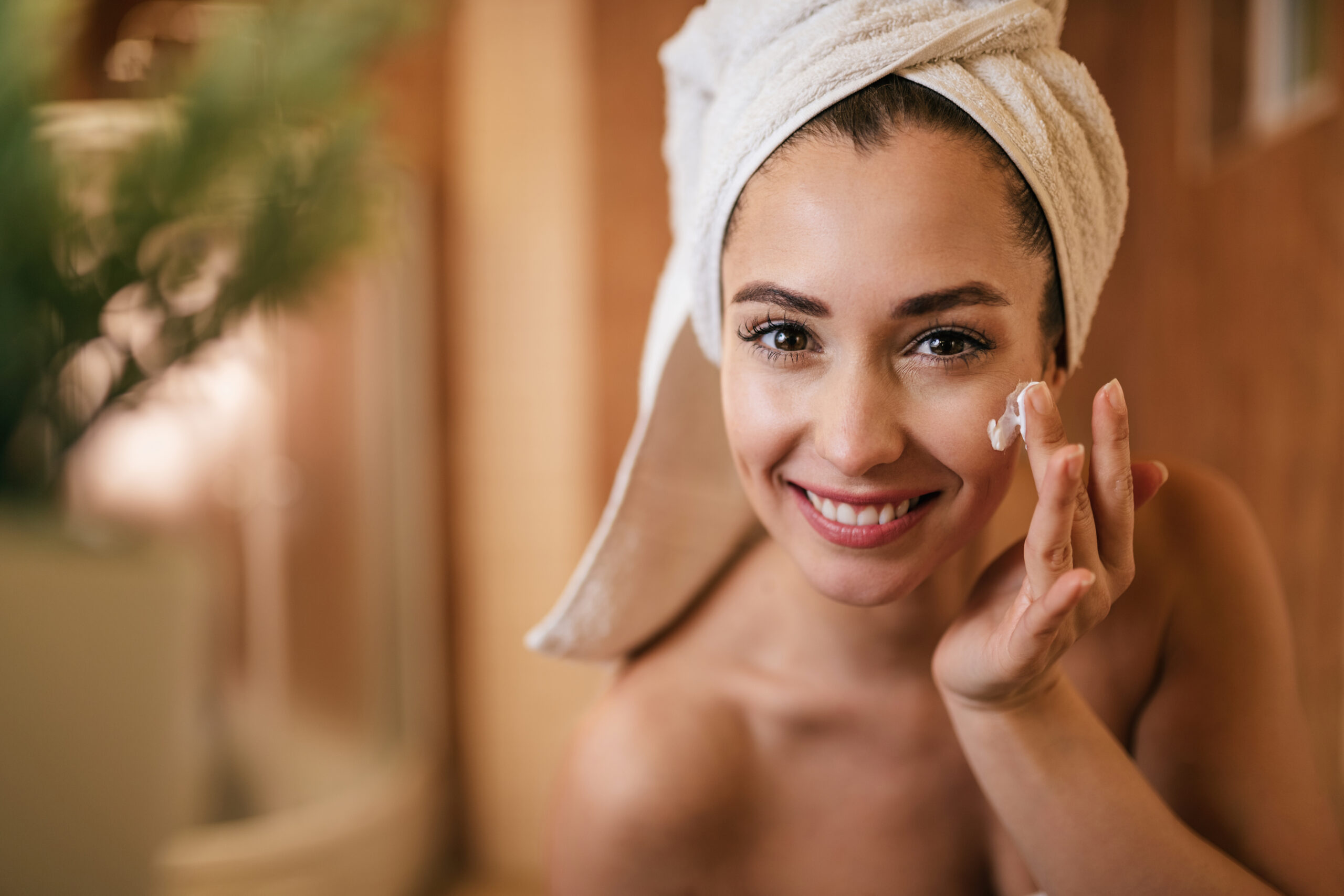 Eyebrow threading aftercare tips: applying soothing cream after threading