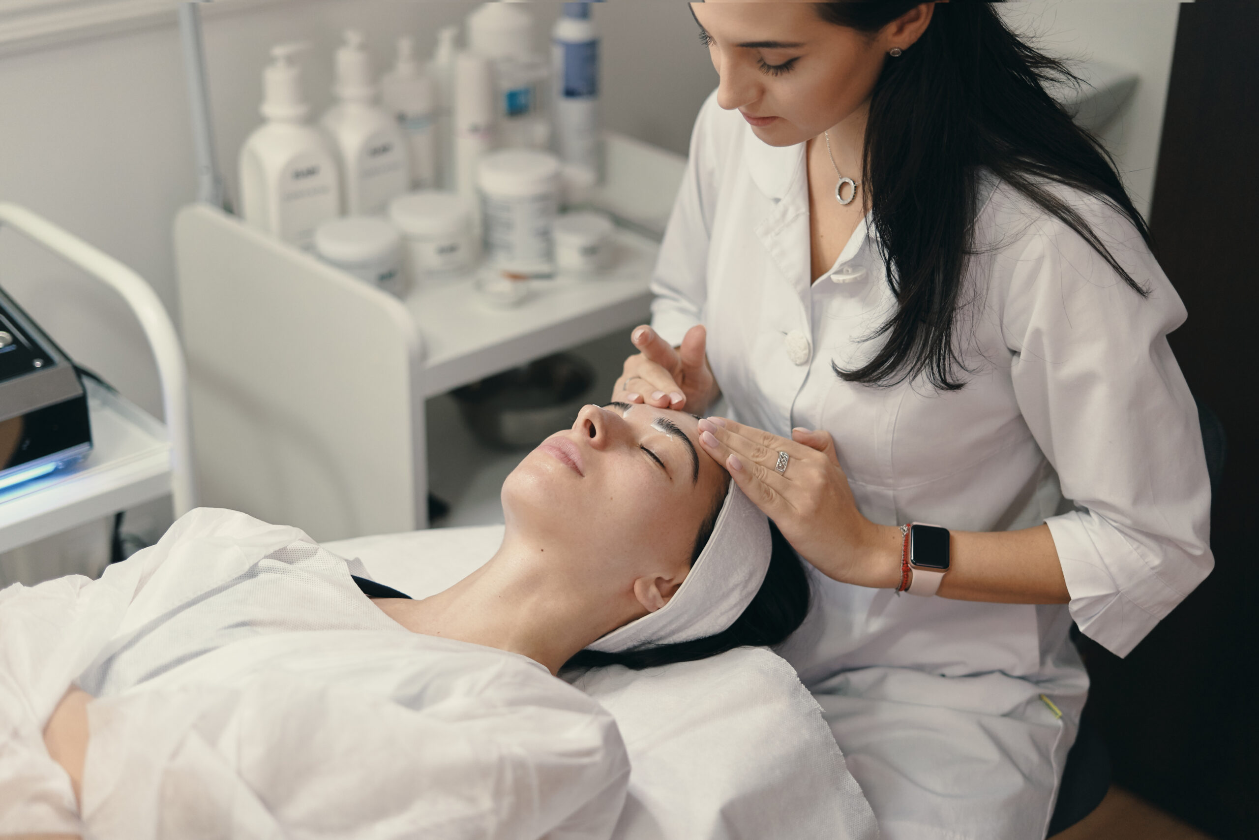 Lash extensions after eyelid surgery or Botox, lash technician preparing for treatment