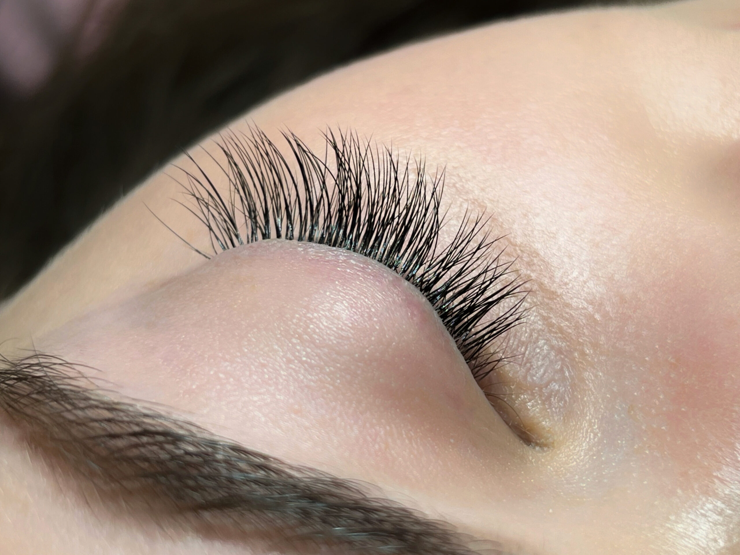 Lash extensions and swimming, sweating, sauna use: classical lash extension closeup